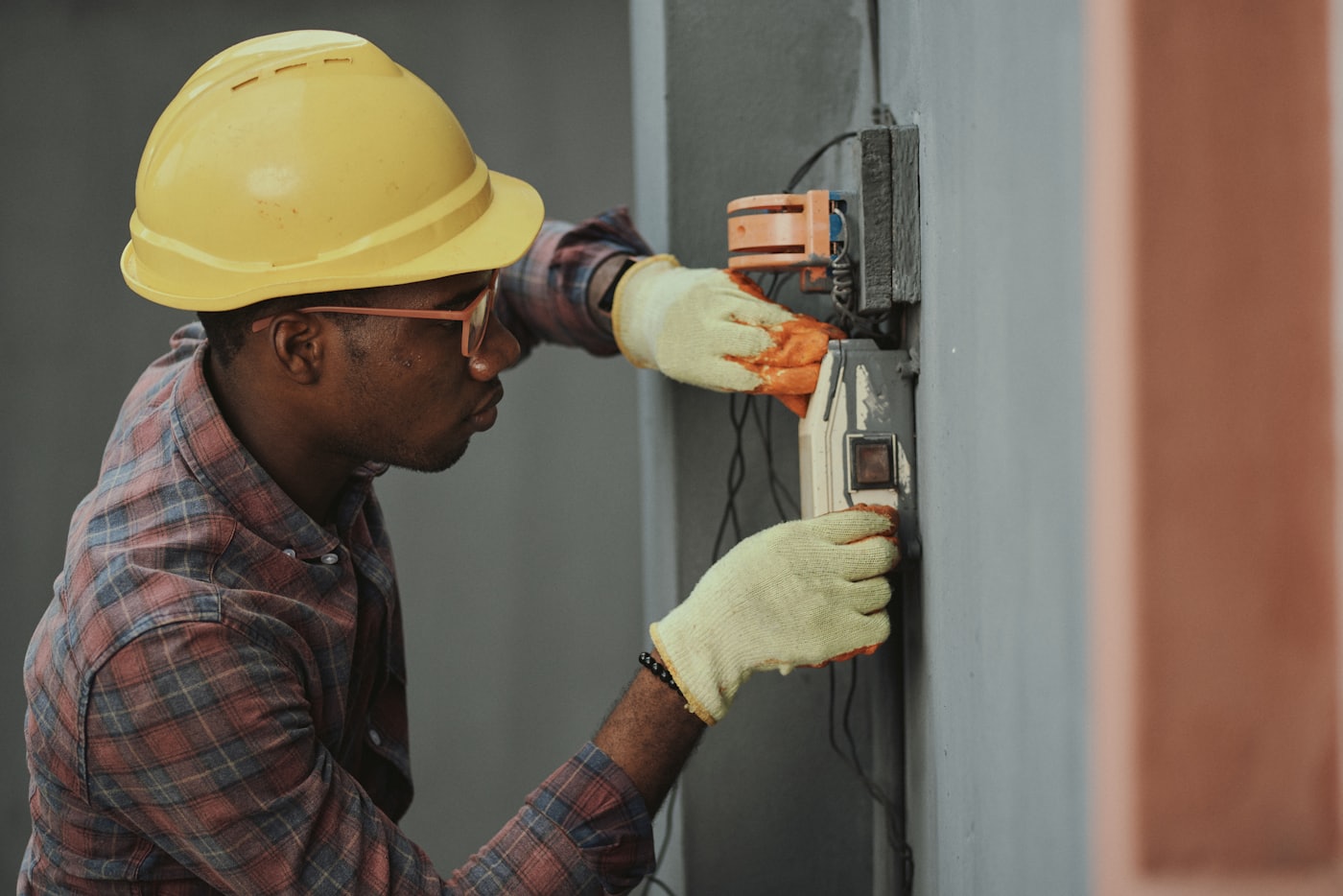 A Row Pro technician at work on a home repair